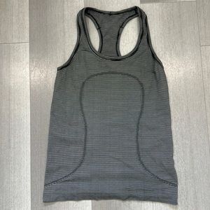 Lululemon swiftly, black and white stripes, size 6